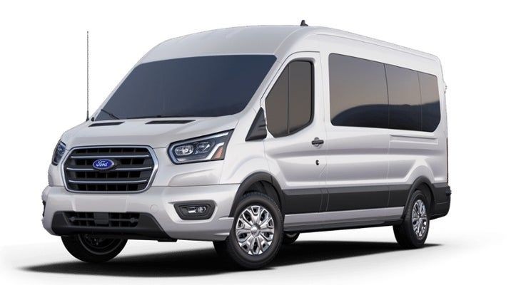 White passenger van with tinted windows and side antenna on a white background.