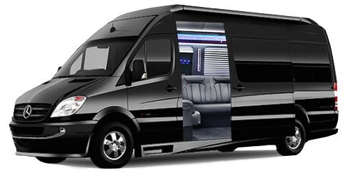 Black luxury van with an open sliding door revealing a stylish interior with leather seating and mood lighting.